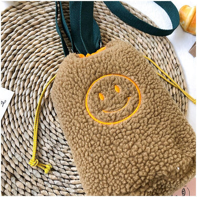 Bolsa Saco com Alça Crossbody Smile Pelucia